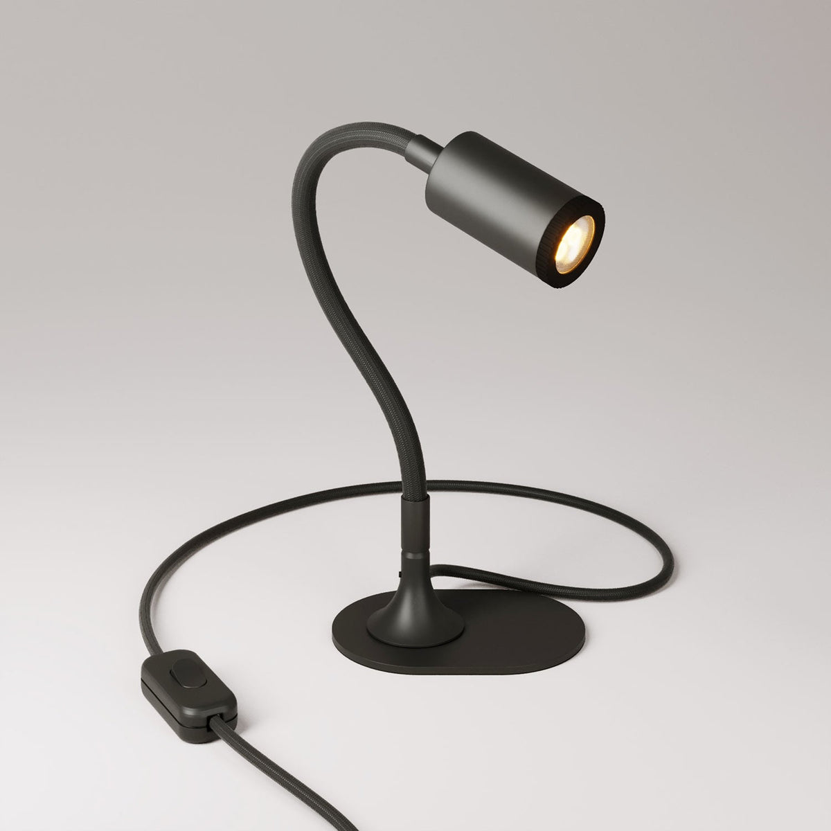 Lampada da scrivania MAG-Y con Flex, base metallica ovale e luce spot - Nero